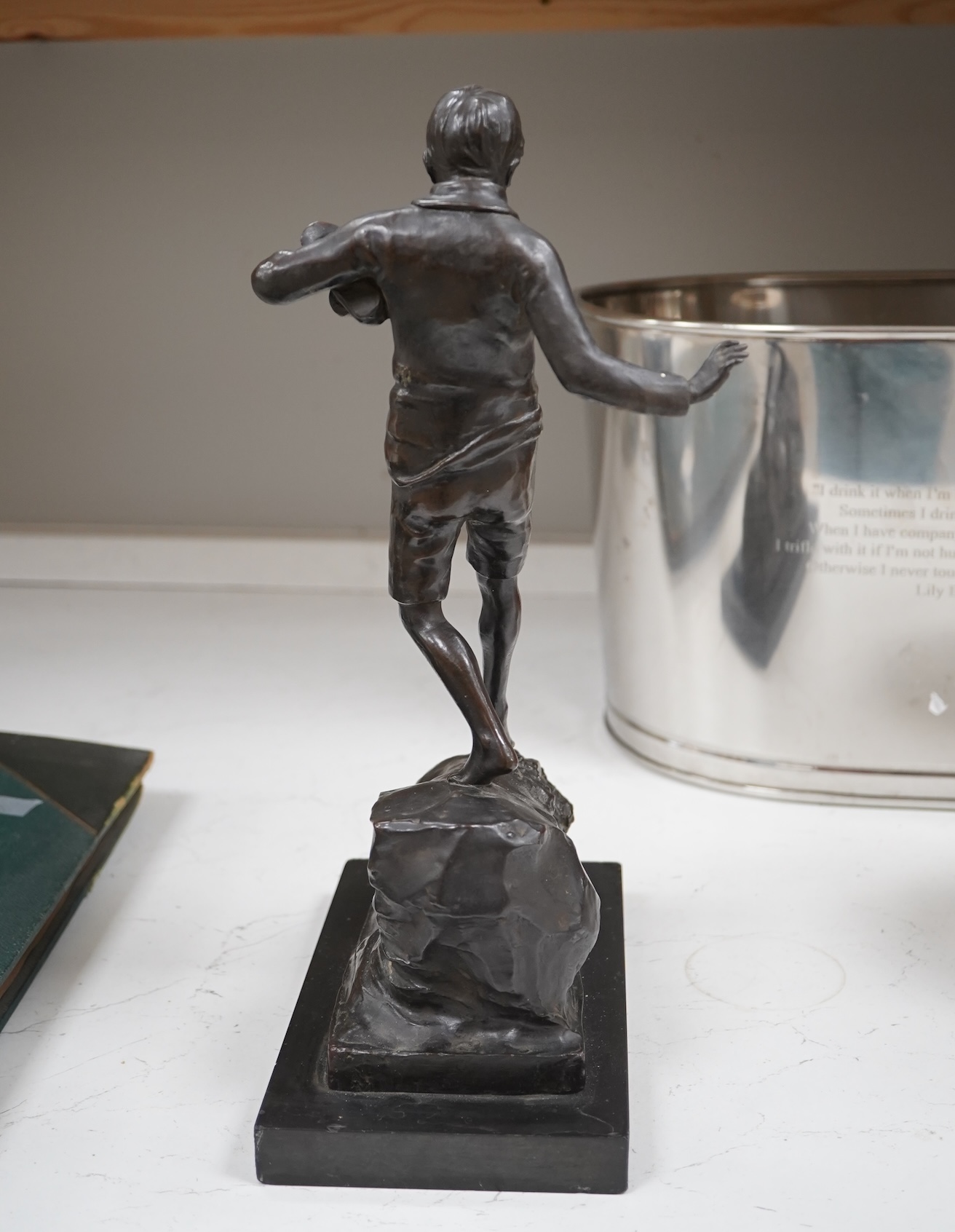 Lorna Adamson (British b.1894-?), an early 20th century bronze figure of a boy, signed and dated 1913, on marble base, 36cm. Condition - nibbles to base, otherwise good